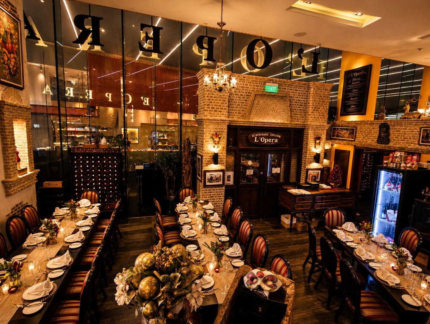 L’Opera’s warmly lit dining room, photographed for its official Facebook page